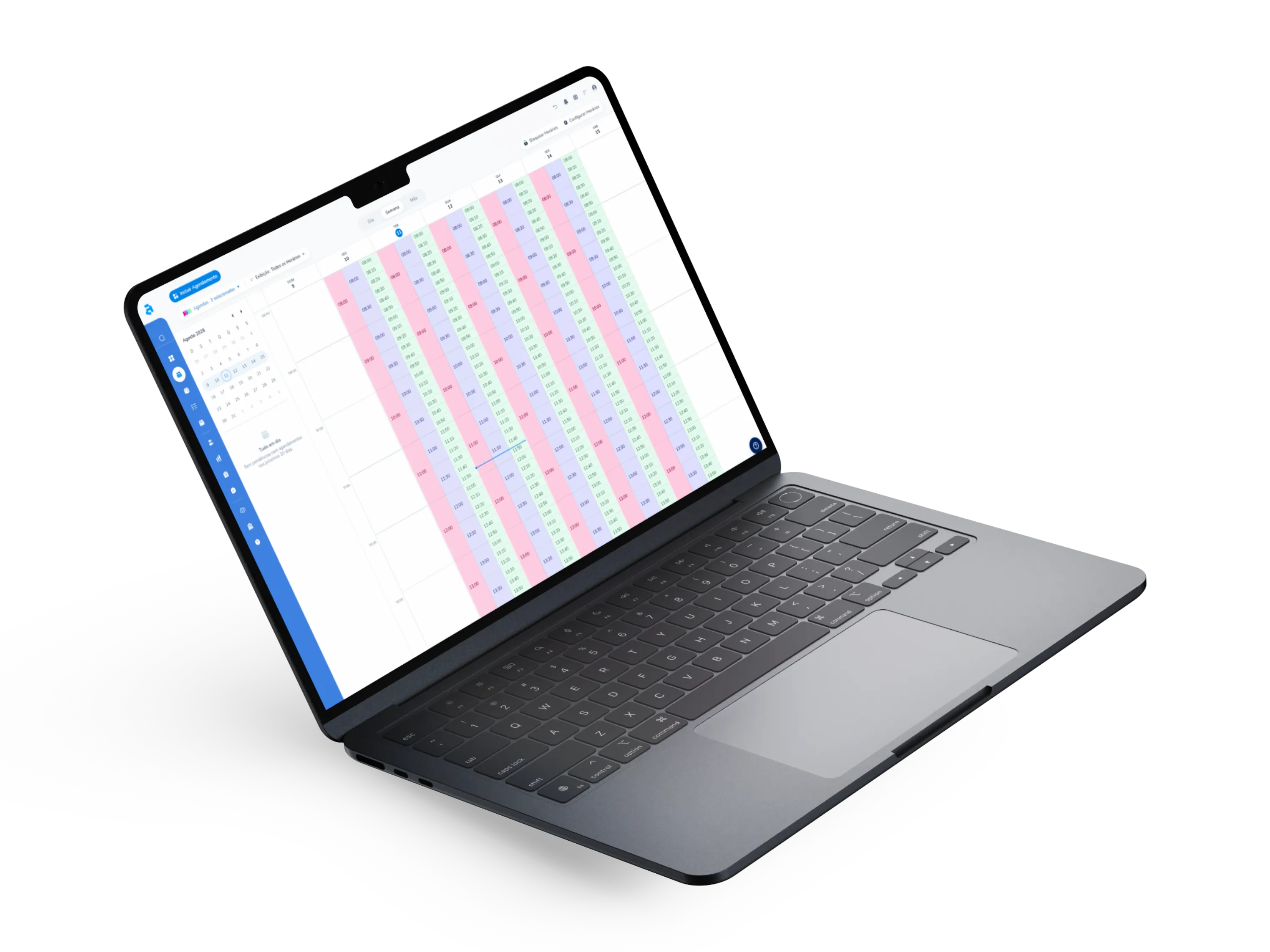 Notebook com a agenda semanal da equipe na Minha Agenda Virtual: os horários de cada profissional aparecem lado a lado, em cores diferentes